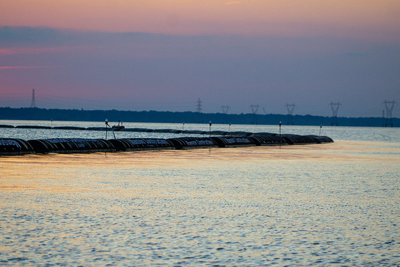 marked floating dredge pipe