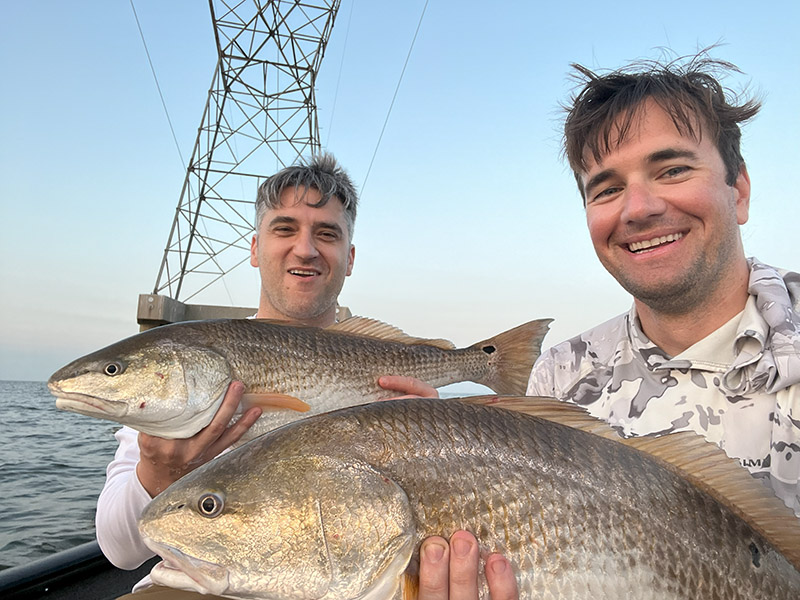 two inshore anglers power line redfish lake pontchartrain